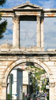 ATHENS, GREECE - SEPTEMBER 12, 2007: view of Arch of Hadrian over street in Athens city. This is monumental gateway, included in Temple of Olympian Zeus comlex, resembling a Roman triumphal arch