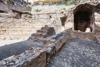 travel to Sicily, Italy - ruins of ancient roman amphitheater Odeon in Taormina city