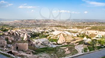 Travel to Turkey - rock-cut buildings in Uchisar village in Cappadocia in spring
