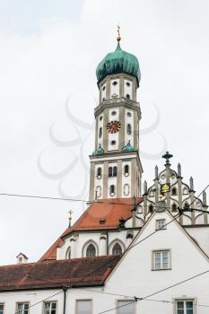 Travel to Germany - towers of SS Ulrich and Afra Church in Augsburg city in cloudy spring day