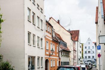 Travel to Germany - residential houses in quarter on Kirchgasse street in Augsburg city in rainy spring day