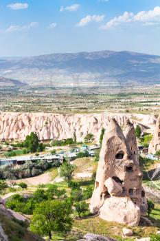 Travel to Turkey - rock-cut pigeon house in Uchisar town in Cappadocia in spring