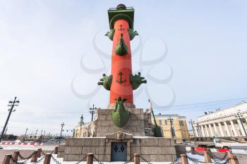 view of Rostral Column on Birzhevaya Ploschad square in Saint Petersburg city in March