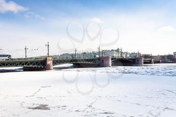The Palace Bridge and frozen Neva river in Saint Petersburg city in March
