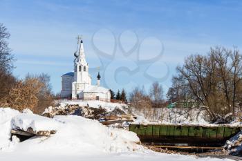 view of Temple of St Cosmas and St Damian (Kozmodemyanskaya Church) on Yarunova Hill from ravine in Suzdal town in winter in Vladimir oblast of Russia