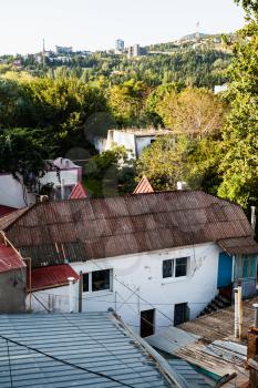 travel to Crimea - view of old residential houses in Alushta city from Baglikov Street in morning