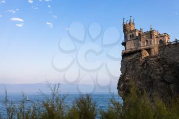 travel to Crimea - view of Swallow Nest Castle on Aurora Cliff in Gaspra District on Crimean Southern Coast of Black Sea in evening