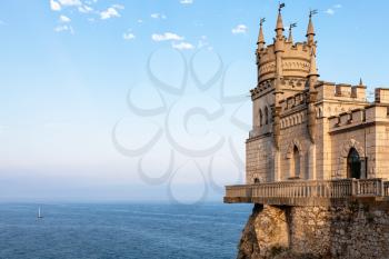 travel to Crimea - view of Swallow Nest Castle over Black Sea in Gaspra District on Crimean Southern Coast in evening