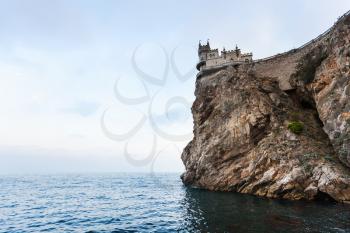 travel to Crimea - Swallow Nest Castle on Ay Todor cape over Black Sea in evening