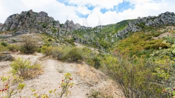 travel to Crimea - view of weathered rocks at Demerdzhi Mountains from The Valley of Ghosts on Crimean Southern Coast