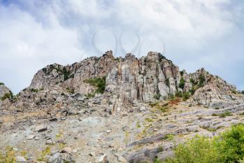 travel to Crimea - view of eroded rocks of Demerdzhi (Demirci) Mountain from natural park The Valley of Ghosts on Crimean Southern Coast