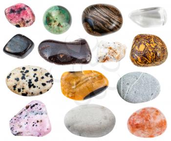 collection of various natural mineral gemstones (greywacke, rhinestone, anthophyllite, dalmatian, mariam stone, hydrogoethite, calcite, rhodonite, rhodochrosite, stromatolite, andesine, etc) isolated