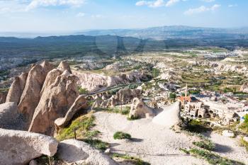 Travel to Turkey - viewpoint over Uchisar village and valley in Nevsehir Province in Cappadocia in spring