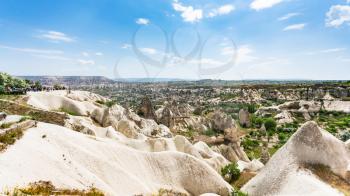 Travel to Turkey - viewpoint on mountains slope and view of Goreme town in Cappadocia in spring