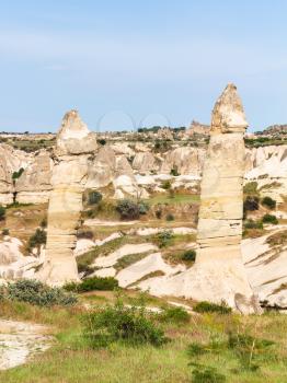 Travel to Turkey - old fairy chimney rocks in mountains of Goreme National Park in Cappadocia in spring