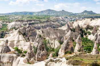 Travel to Turkey - ancient rock-cut houses in Goreme National Park in Cappadocia in spring