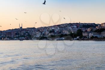 Travel to Turkey - view of old district of Istanbul city on Golden Horn bay in spring evening