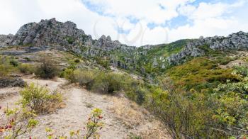 travel to Crimea - view of eroded rocks at Demerdzhi Mountains from The Valley of Ghosts on Crimean Southern Coast