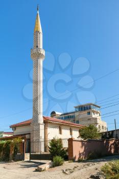 travel to Crimea - view of Yuhara-Jami mosque on Upper Street on Castle hill in Alushta city in sunny day