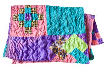 folded handmade stitched silk patchwork scarf isolated on white background