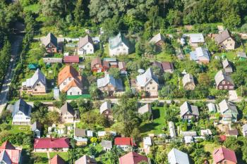 above view of cottages in suburban village in Moscow Region near Nakhabino settlement of Krasnogorsk town in summer day