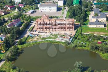 above view of construction of apartment house in settlement in Moscow Region in Pavlovskoye village of Istrinsky district in summer day