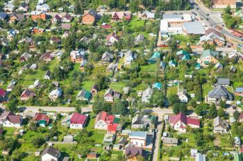 above view of cottages in suburb of Istra town in Moscow Region in in summer day