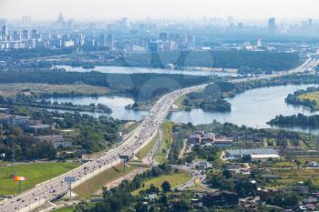 Above view of Novorizhskoye Shosse of Russian route M9 Baltic Highway over Moskva river in Pavshinsky Floodplain near Moscow city