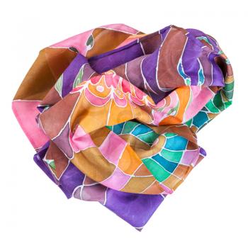 crumpled hand painted brown, violet, green batic silk scarf isolated on white background