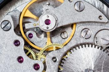 watchmaker workshop - detail of mechanical clockwork close up
