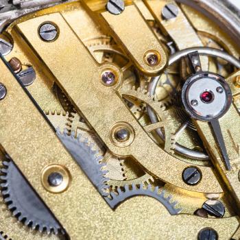 watchmaker workshop - brass clockwork of old mechanical watch