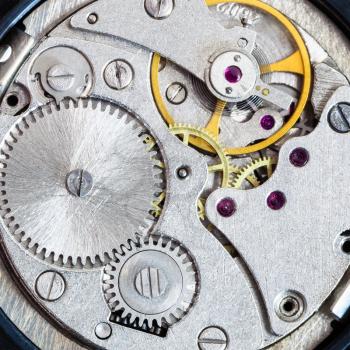 watchmaker workshop - steel clockwork of old mechanical wristwatch