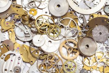 watchmaker workshop - background from many used watch spare parts