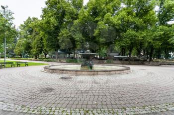 travel to Latvia - view of oldest city fountain in Vermanes Garden (Vermanes darzs) in Riga city in september. The fountain was installed here in 1869