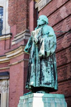 Travel to Germany - Martin Luther Monument near of St Michael's church (Hauptkirche Sankt Michaelis) in Hamburg city. Statue was made by sculptor Otto Lessing in1912