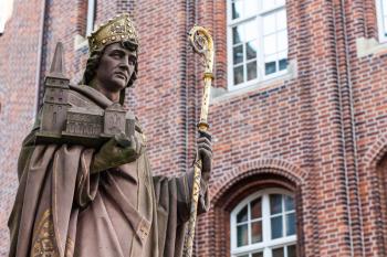 Travel to Germany - statue of statue was of St Angsar ( Archbishop Ansgar von Hamburg - Bremen, the founder of Hamburg cathedral in Old Town) on Trostbrucke bridge in Hamburg city in september