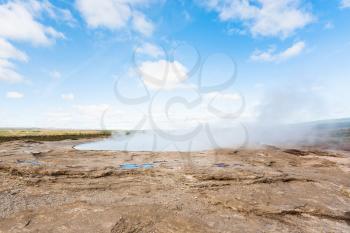 travel to Iceland - crater of The Geisyr (The Great Geysir) in Haukadalur hot spring area in autumn