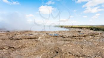 travel to Iceland - crater of The Geisyr (The Great Geysir) in Haukadalur hot spring valley in autumn