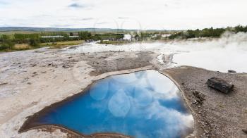travel to Iceland - pool of The Geisyr (The Great Geysir) in Haukadalur hot spring area in autumn