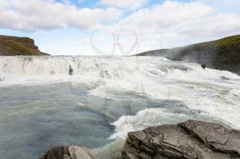 travel to Iceland - water on rapids of Gullfoss waterfall in canyon of Olfusa river in september