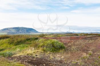 travel to Iceland - flat land with old volcano near Kerid Lake in september
