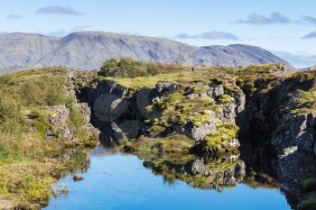 travel to Iceland - view of Silfra rift in valley of Thingvellir national park in september