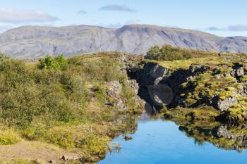 travel to Iceland - view of Silfra gorge in valley of Thingvellir national park in september