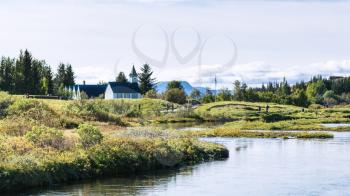 travel to Iceland - Thingvallakirkja church near Oxara river in Thingvellir national park in september