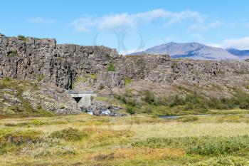travel to Iceland - river pass in Logberg mountains in Thingvellir national park in september