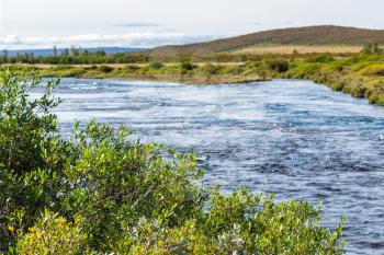 travel to Iceland - riverbank of Bruara river in autumn