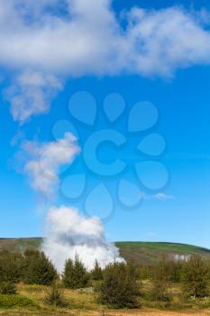 travel to Iceland - geyser eruption in Haukadalur valley in september