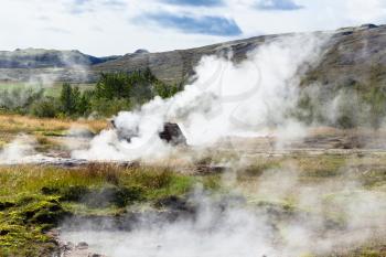 travel to Iceland - many geysers in Haukadalur valley in september