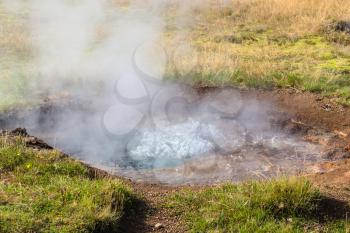 travel to Iceland - pool of little geyser in Haukadalur valley in september