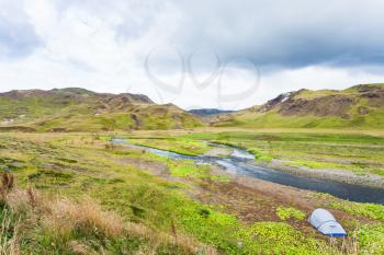 travel to Iceland - tourist tent in valley of Varma river in Hveragerdi Hot Spring River Trail area in september
